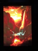 Litofania - La cascata infuocata - 13x18cm - incorniciato - retroilluminato - USB - cavo usb-c incluso